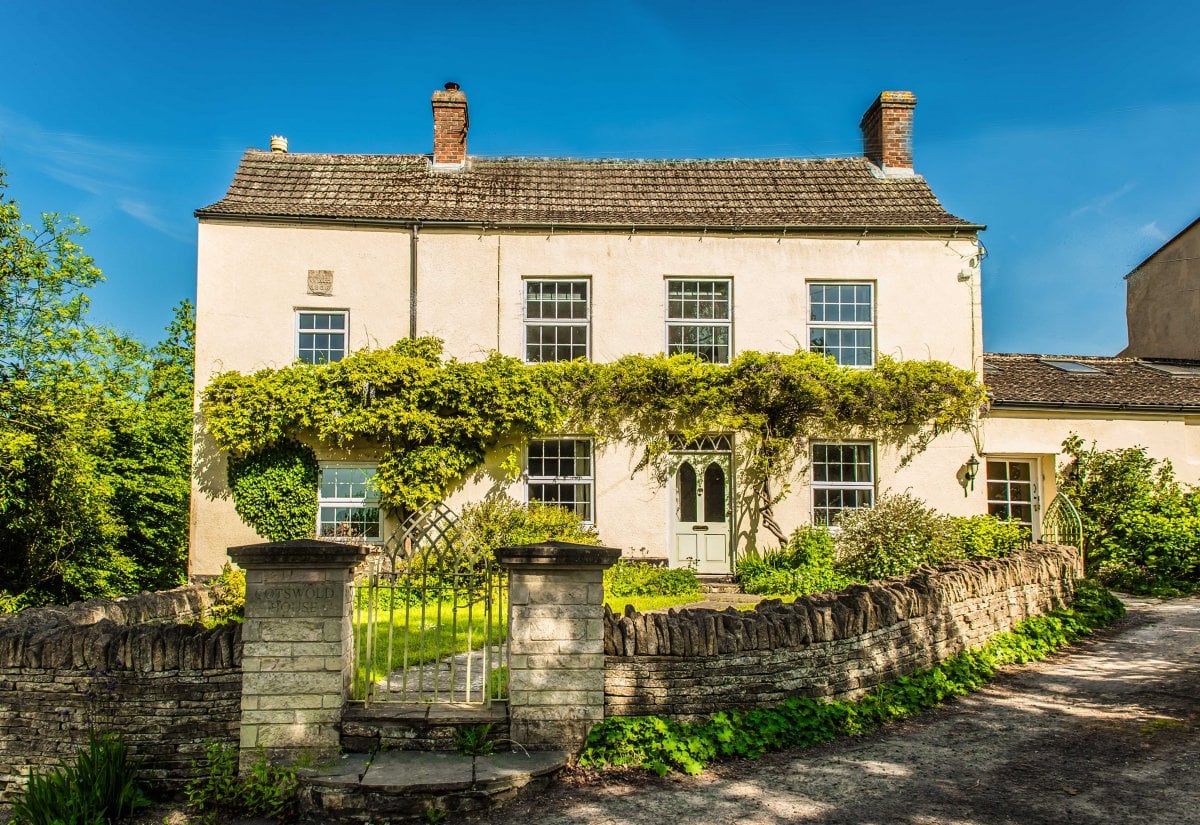 Cotswold House with the wisteria in full bloom